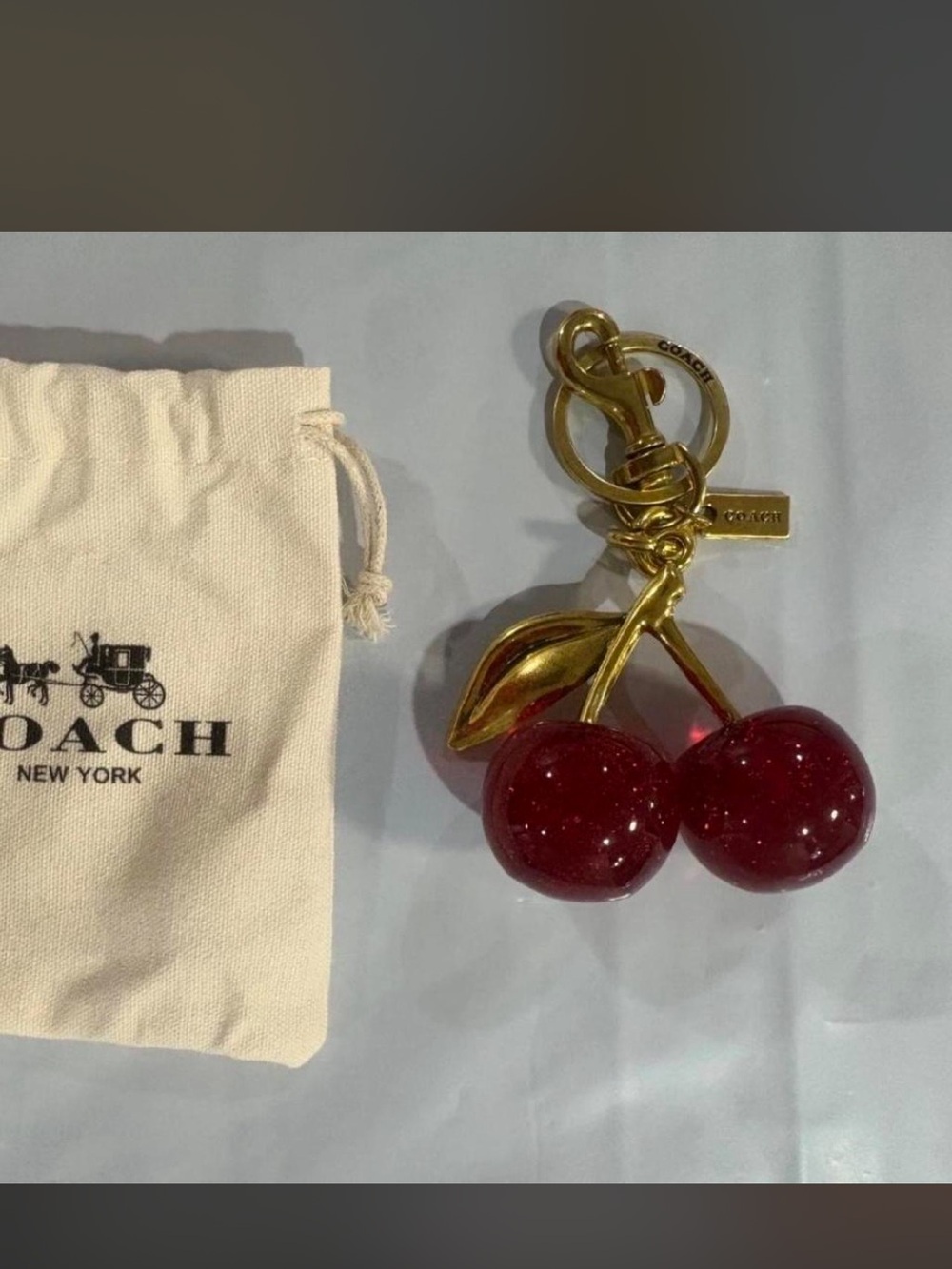 COACH Gold-Tone Cherry Keychain with Glossy Red Cherries
